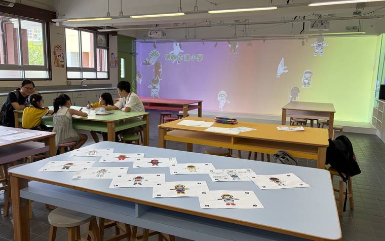 Starry Art Wall: scanned student artwork floating across the projected starfield